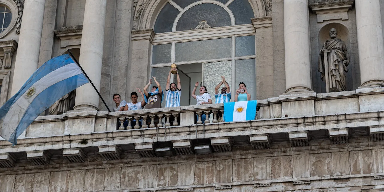 Argentina players celebrate winning the 2022 World Cup — the reigning champions defending their title at 2026