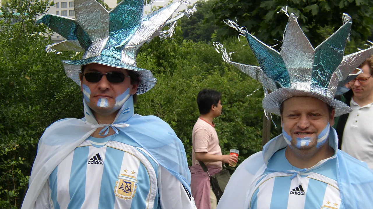 Argentina fans in light-blue stripes — World Cup 2026 kits and jerseys guide for all 48 teams, Adidas Nike Puma manufacturer breakdown, authentic vs replica versions