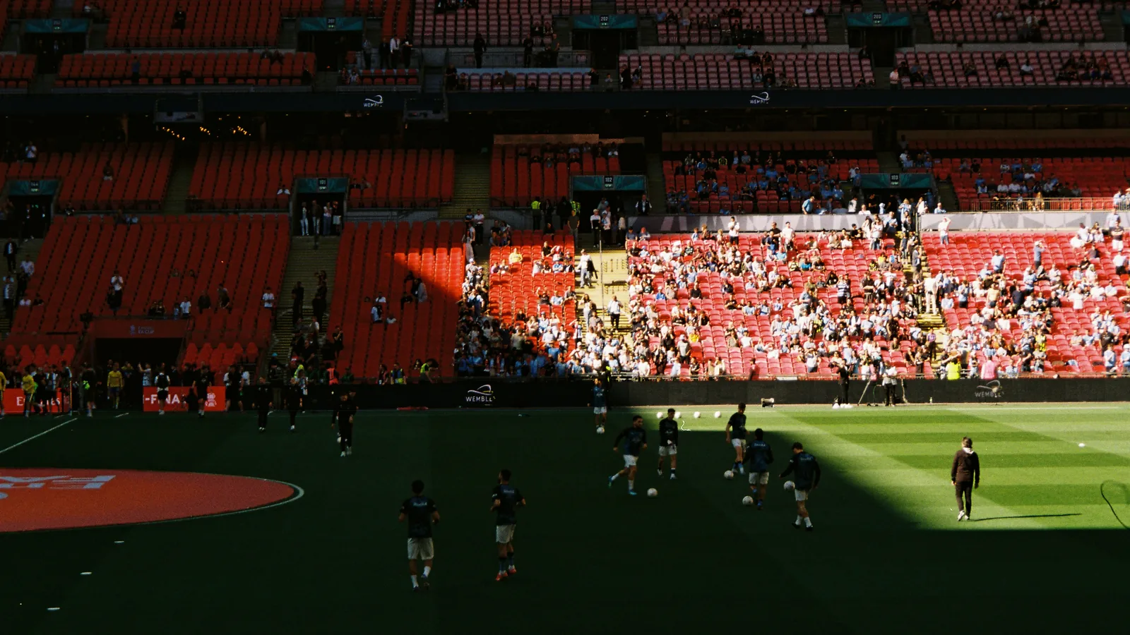 England supporters wave St George's flags in the stands, evoking England's 2-1 win over Mexico in the World Cup 2026 Round of 16 at the Azteca on July 5