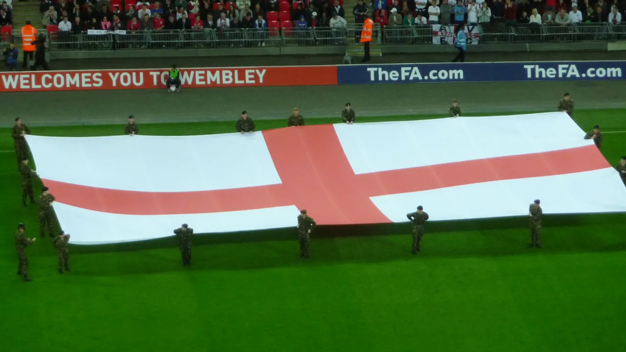 Wembley Stadium arch lit up at night — England's World Cup 2026 group stage airs free-to-air on BBC and ITV in the UK